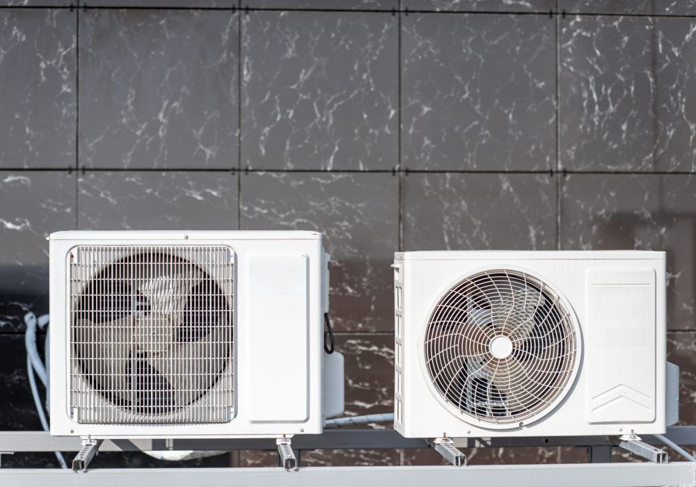 Outdoor units of the air conditioner or heat pump on the building facade